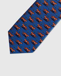 Embroidered, not printed Royal Tiger Tie flat blade showing repeating tiger motifs in orange thread on blue mulberry silk