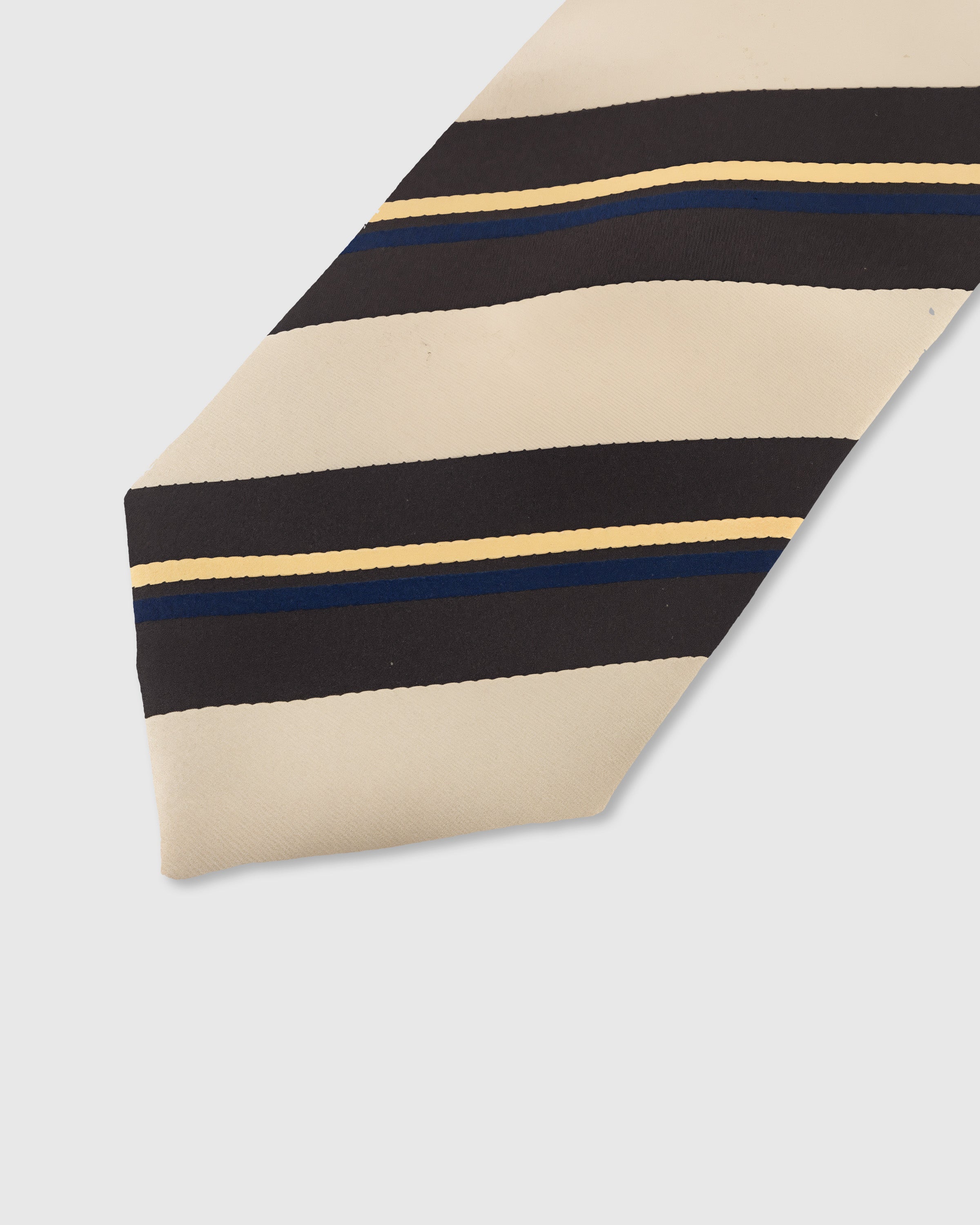SANDSTONE REGIMENT TIE — 45° Italian bias-cut construction with structured interlining, hand-finished slip stitching visible on interior
