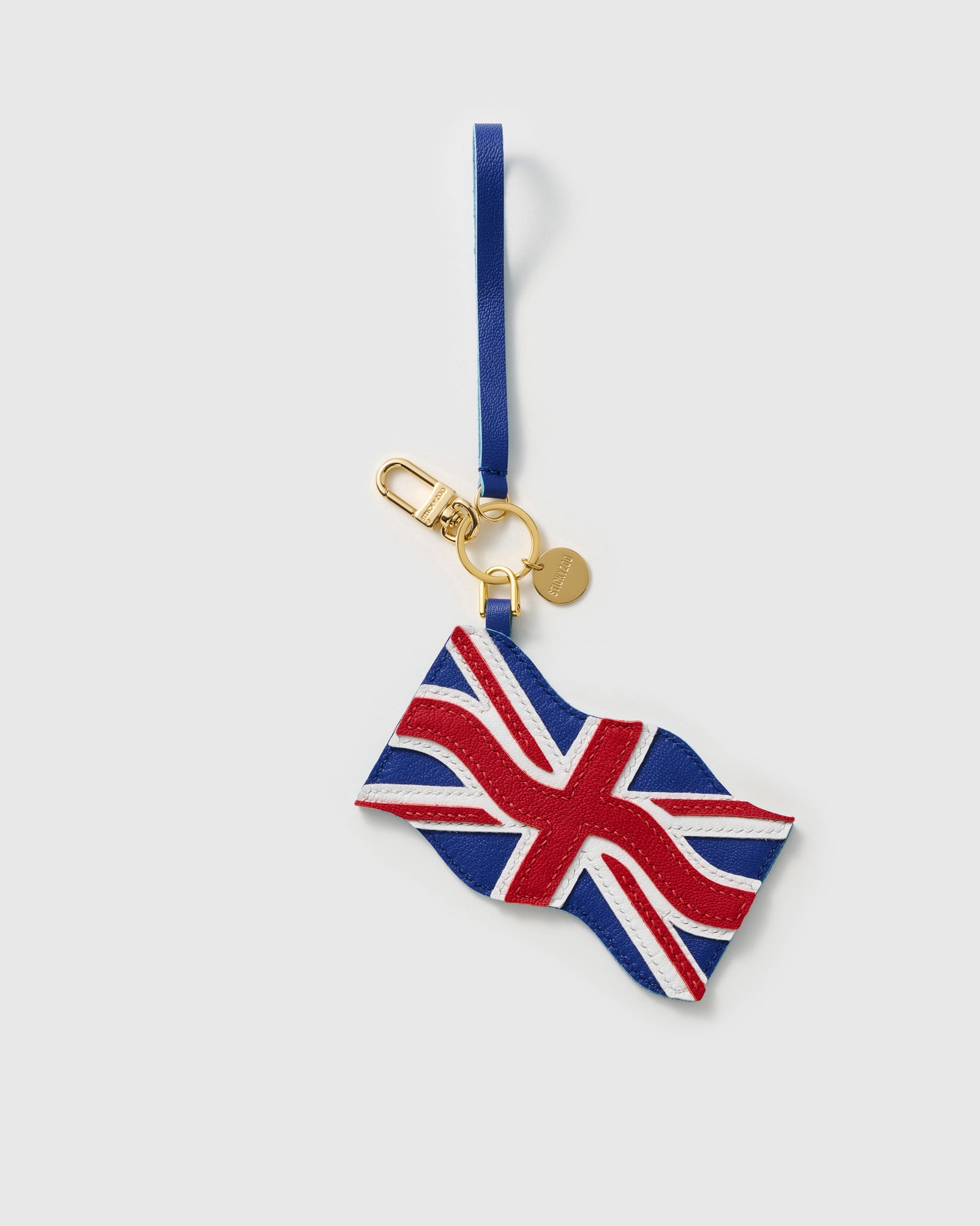 Union Jack charm draped on black bag — handmade French Alran leather by STICKYZOO
