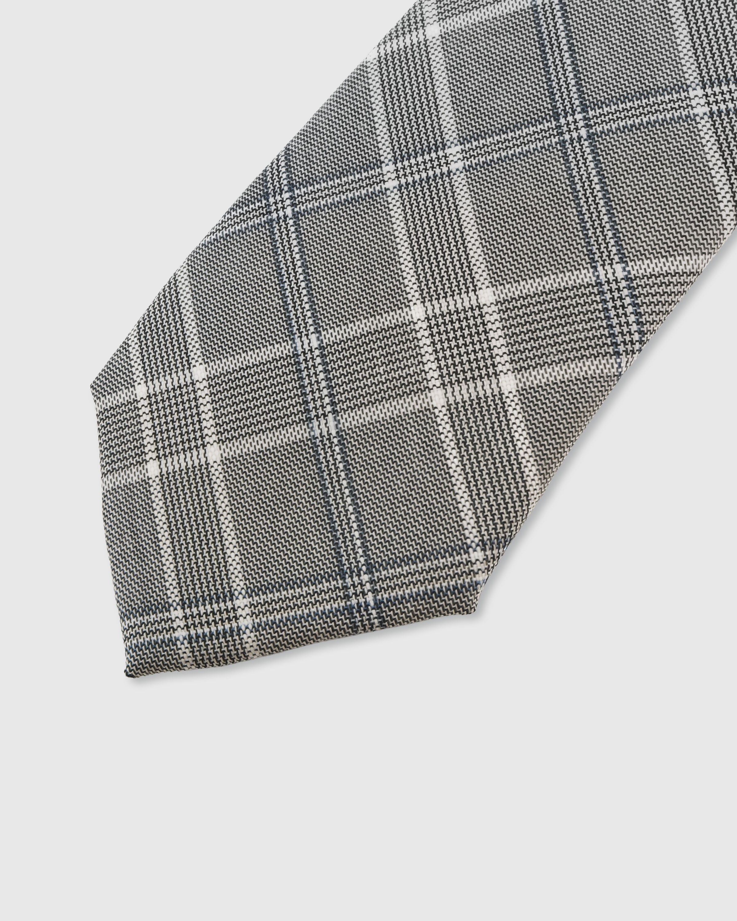 {Bold glen check pattern detail} Glen check detail on sterling grey mulberry silk tie showing embroidered pattern by STICKYZOO