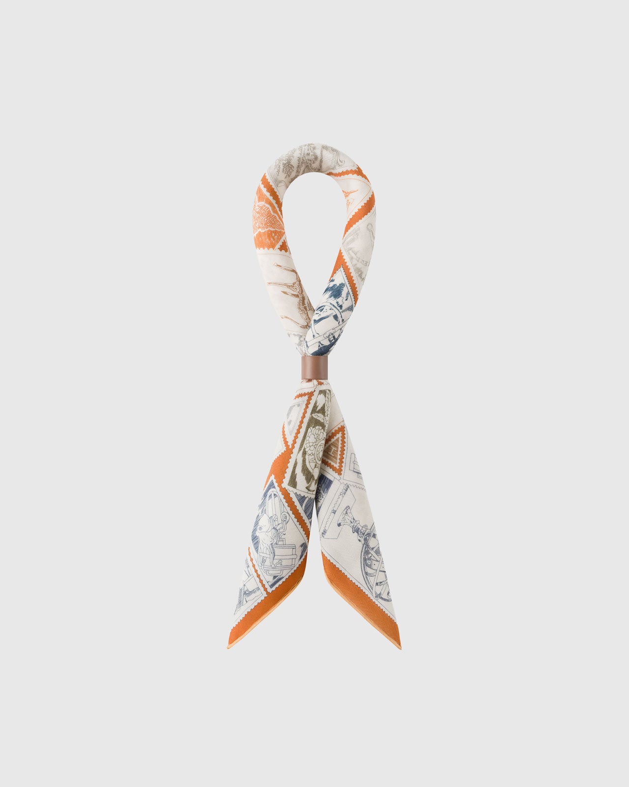 STICKYZOO philatelist silk scarf folded into a bow showing the vintage stamp print and orange frame