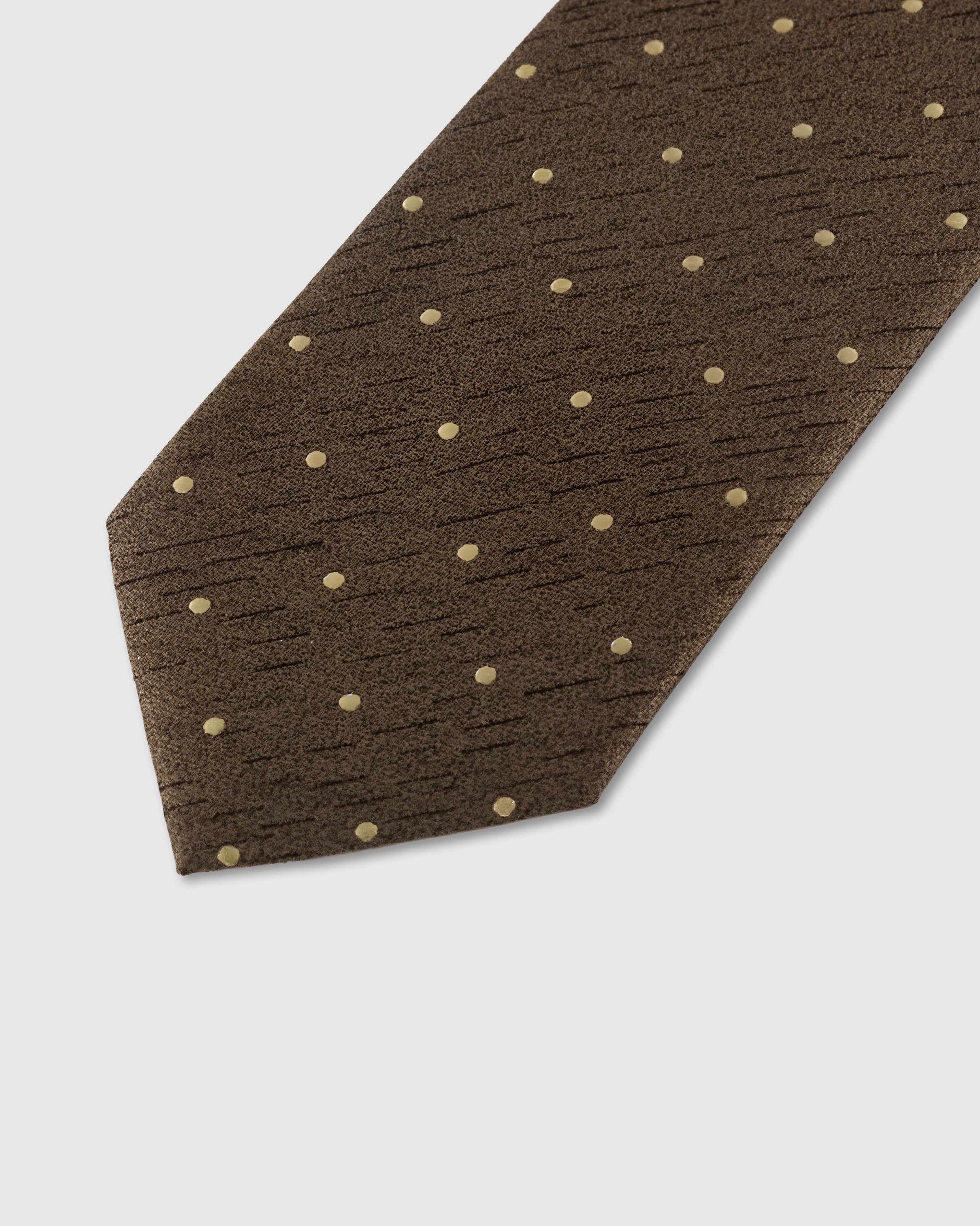 Gold pin dot detail on truffle mulberry silk tie showing hand-embroidered dots on slub texture by STICKYZOO
