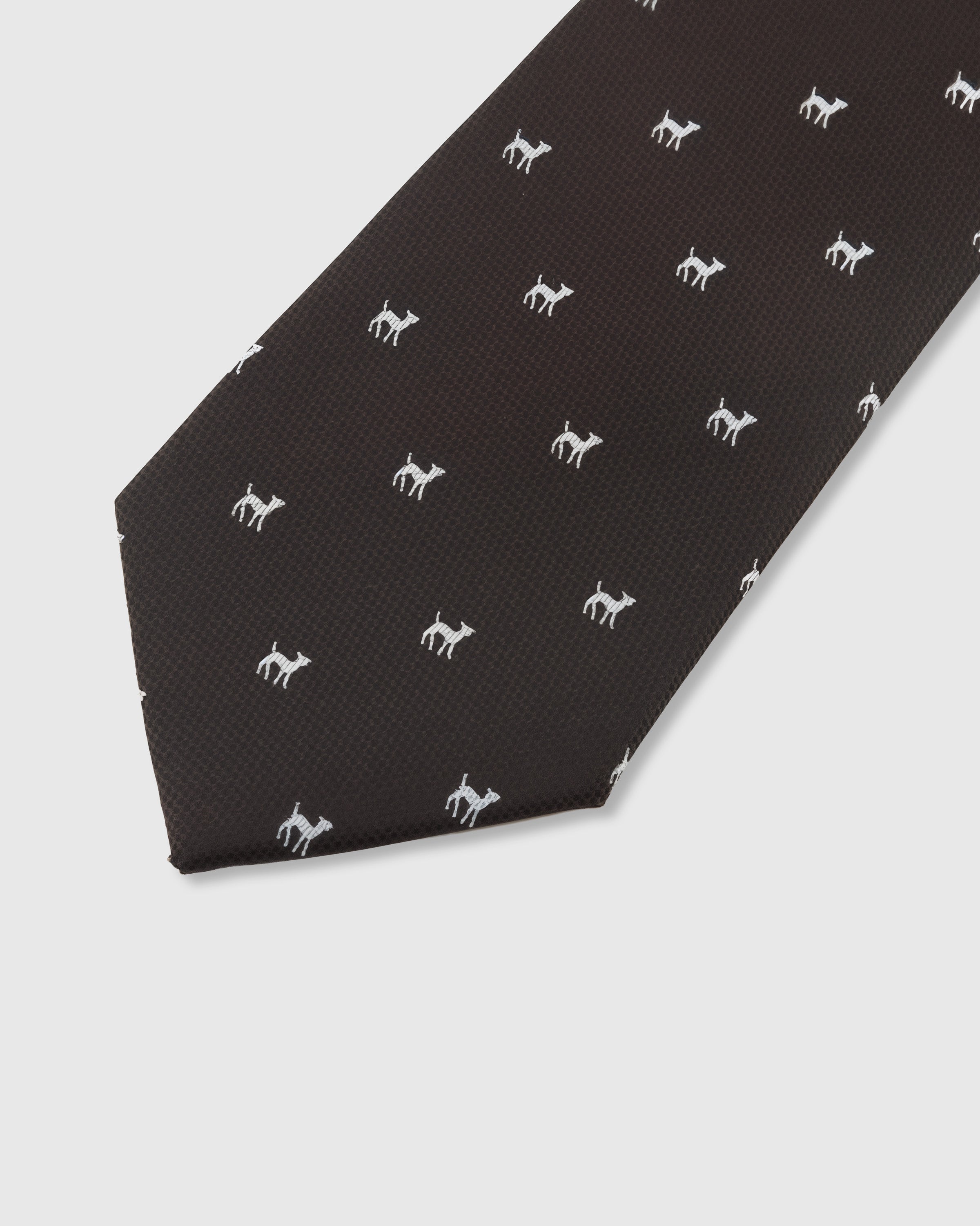ESPRESSO TERRIER TIE — 45° Italian bias-cut construction with structured interlining, hand-finished slip stitching visible on interior