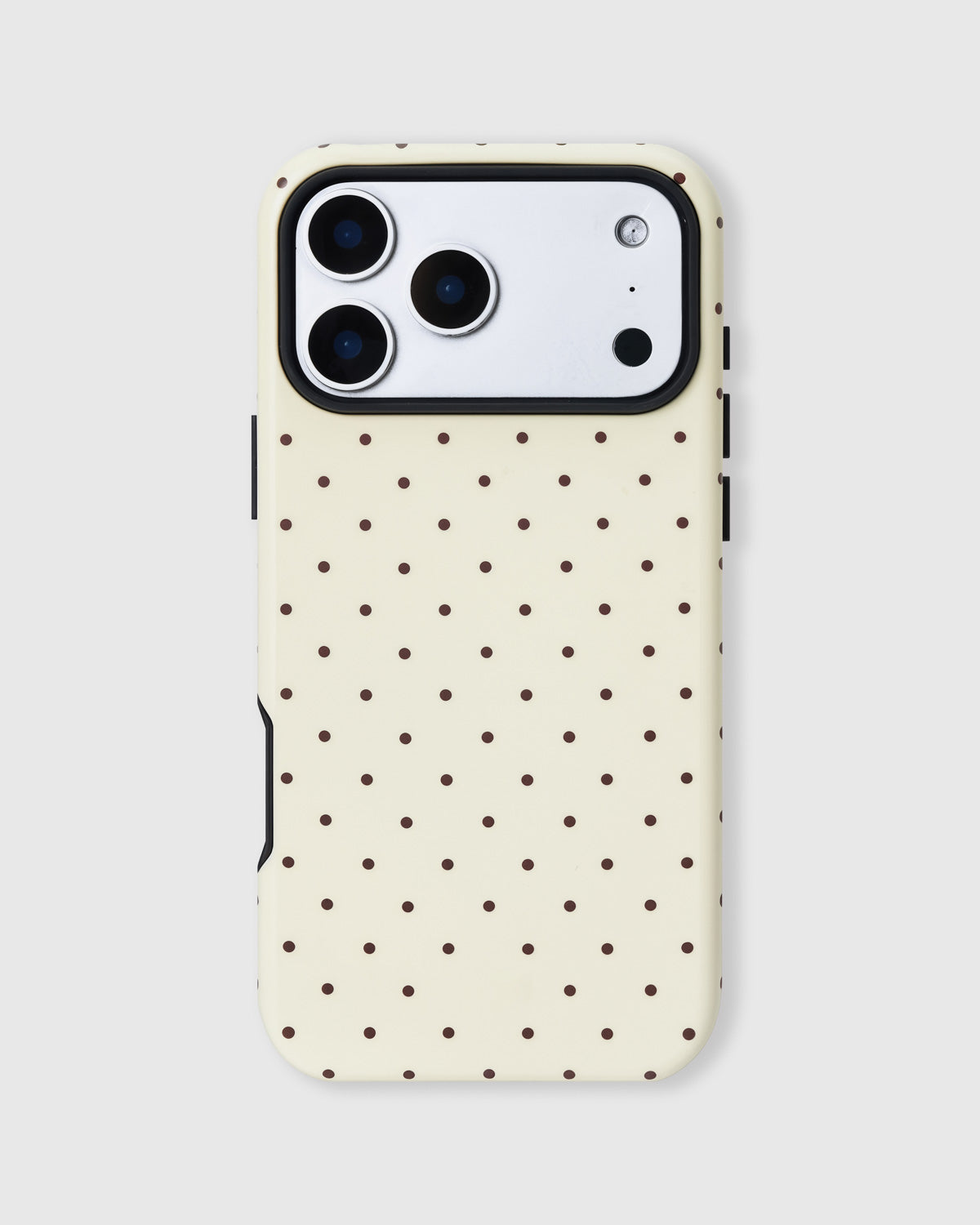 Back of the lucky clover phone case showing evenly spaced brown polka dots on matte UV-printed ABS