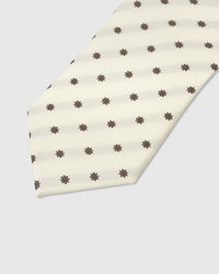 Cocoa floret dot detail on ivory mulberry silk tie showing raised hand-embroidered thread by STICKYZOO