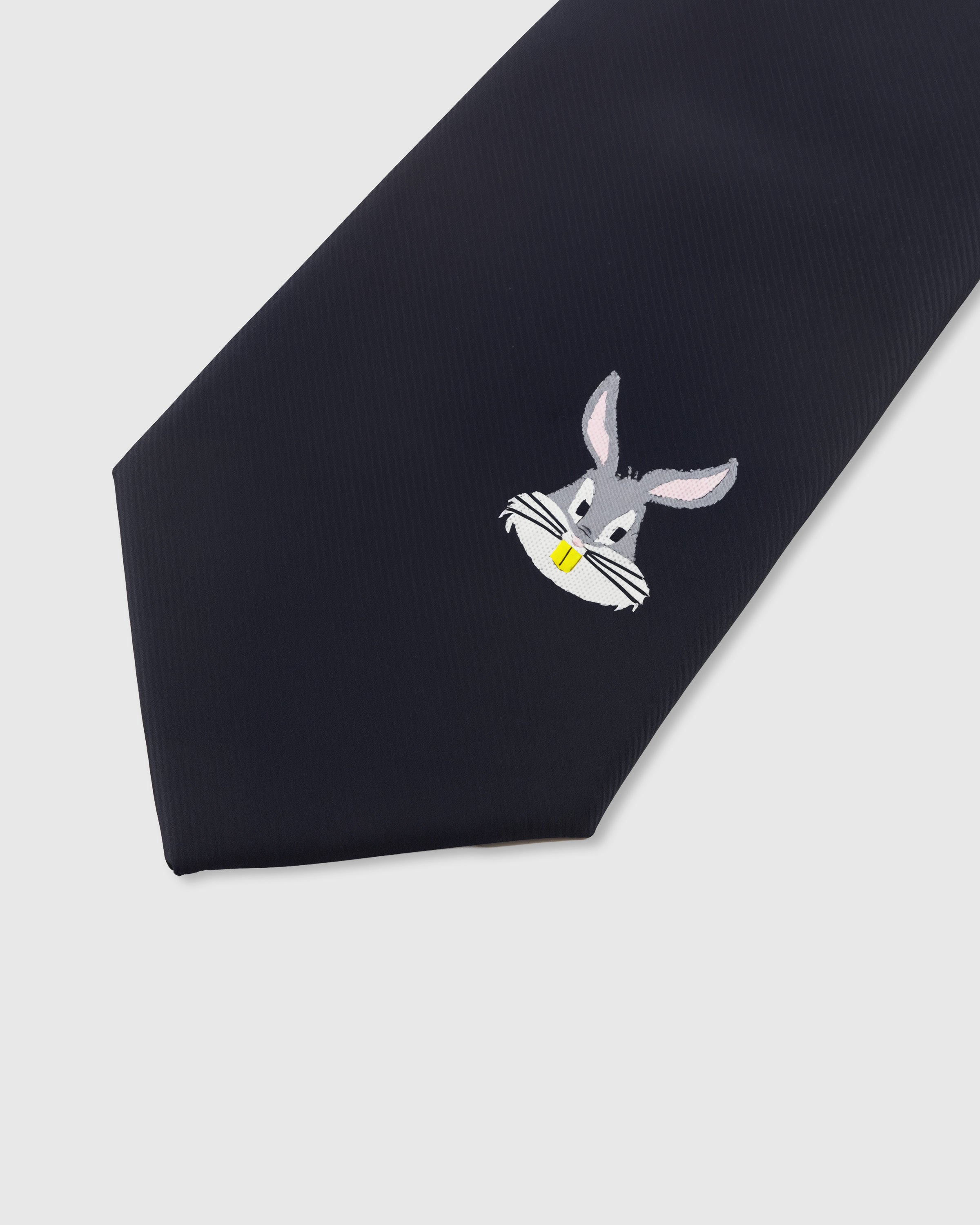 MIDNIGHT RABBIT TIE — 45° Italian bias-cut construction with structured interlining, hand-finished slip stitching visible on interior