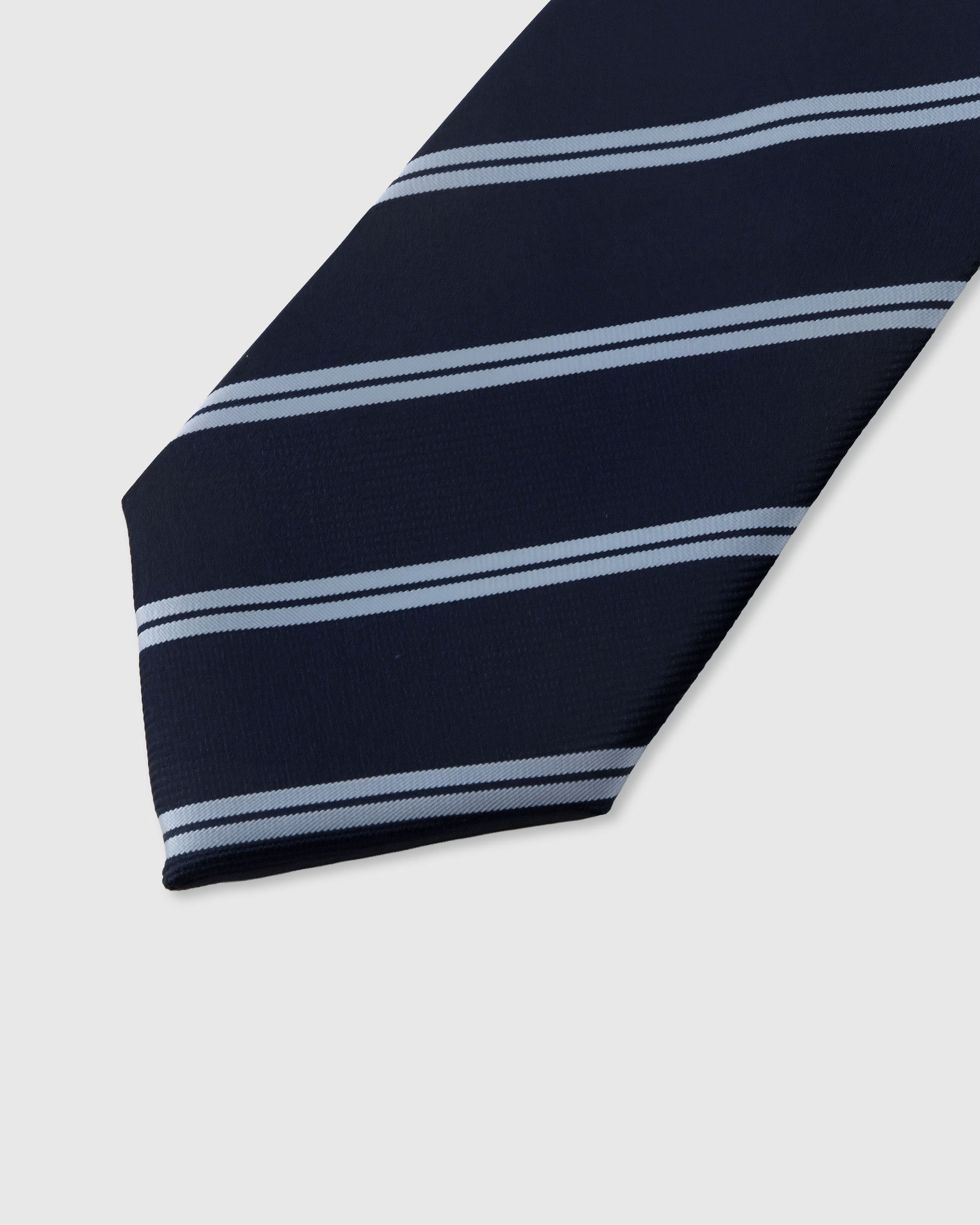 STICKYZOO NAVY SILVER STRIPE TIE — hand-embroidered detail showing silver-blue double diagonal stripes, stitched not printed