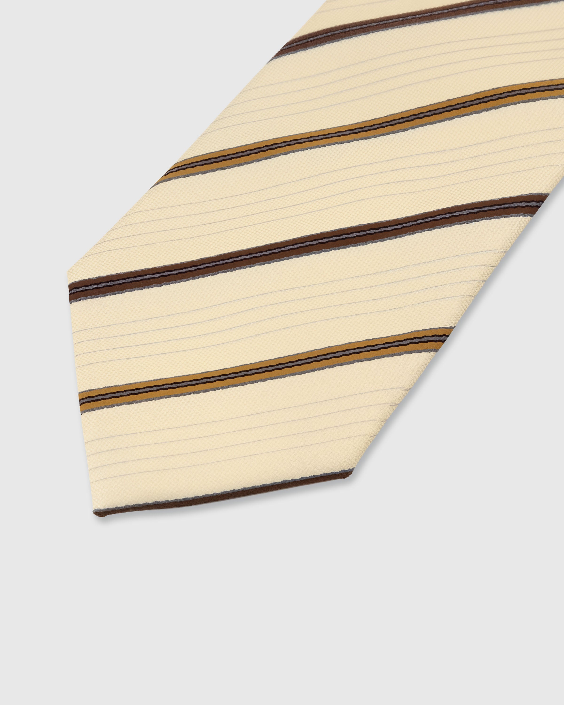 STICKYZOO Cream Heritage Stripe Tie — detail of hand-embroidered heritage stripe on pure mulberry silk