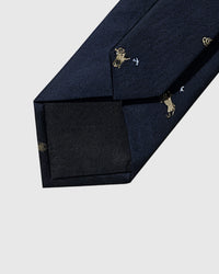 Hand-finished interior Golfer Tie back view showing structured interlining, tipping, and golfer motifs on navy mulberry silk