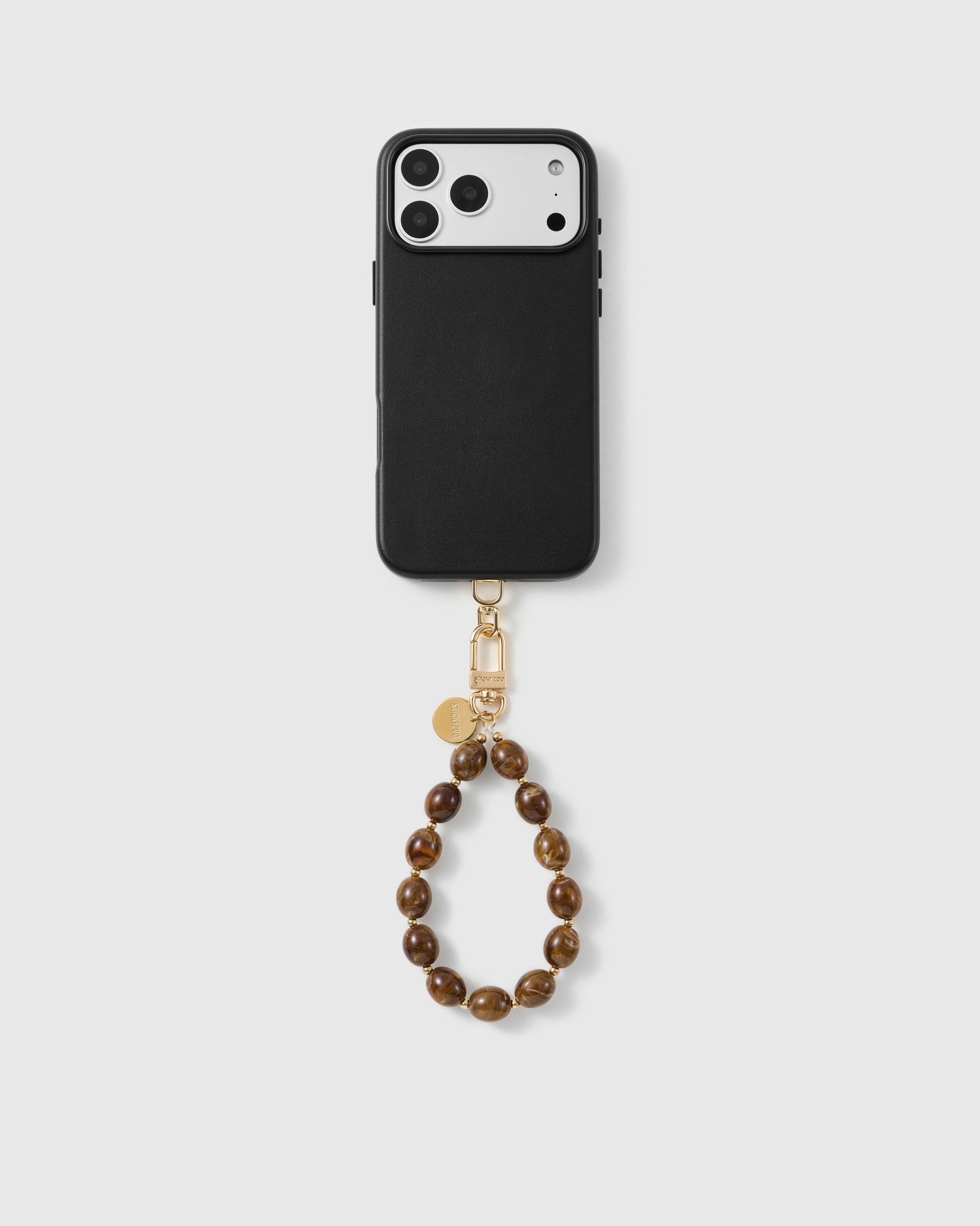 Handmade beaded phone strap on a black case, rated 4.9 across 5,000+ reviews