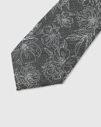 Ivory botanical floral outline detail on slate mulberry silk tie showing raised hand-embroidered petals by STICKYZOO