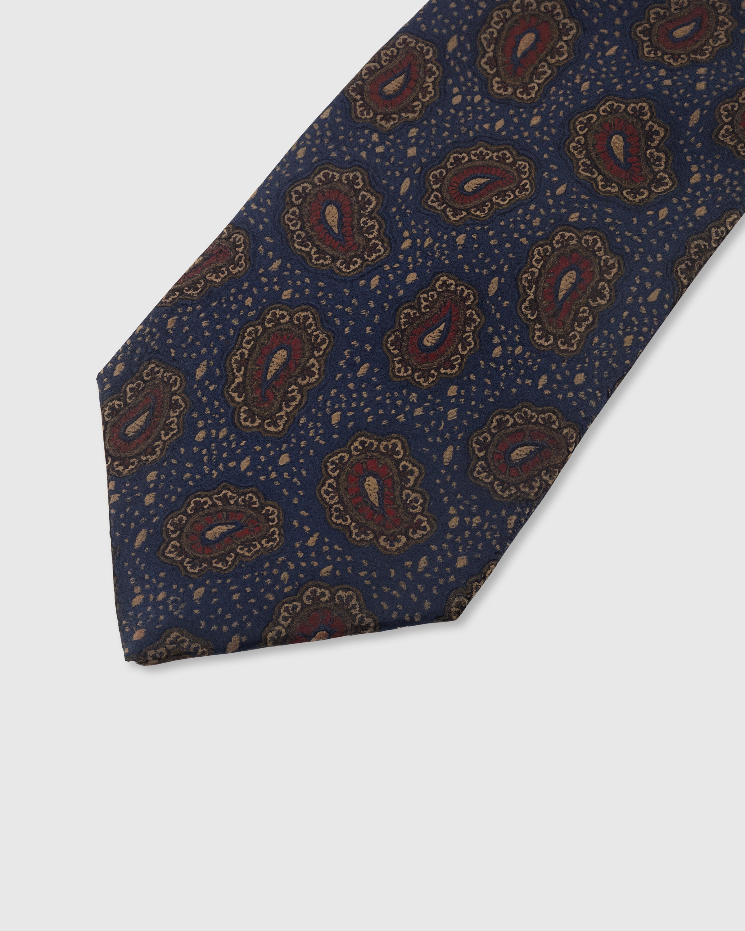 Ornate burgundy and gold paisley detail on midnight mulberry silk tie showing raised hand-embroidered motifs by STICKYZOO