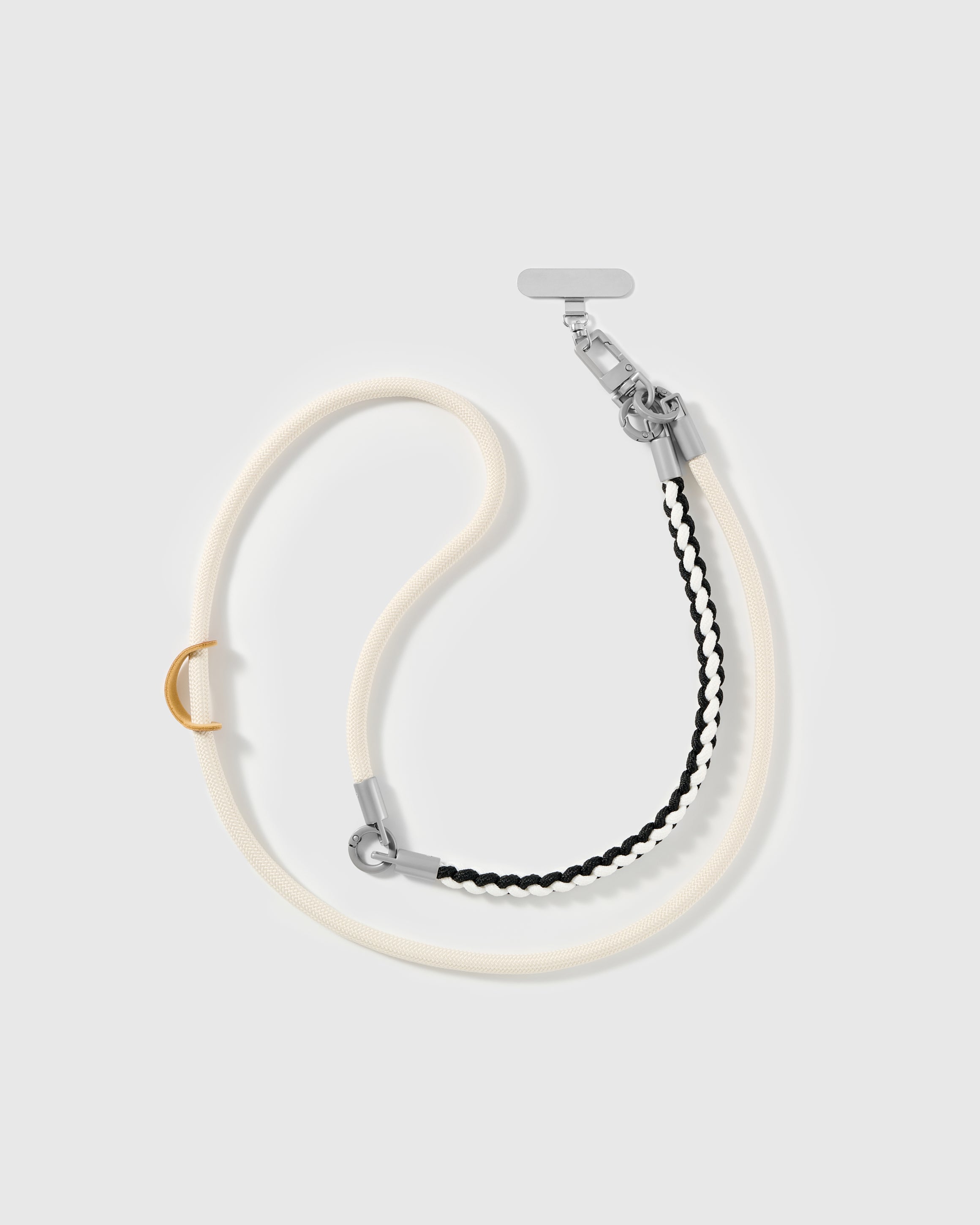 Full length of the adjustable ivory braided strap worn cross-body or over the shoulder — rated 4.9 across 5,000+ reviews