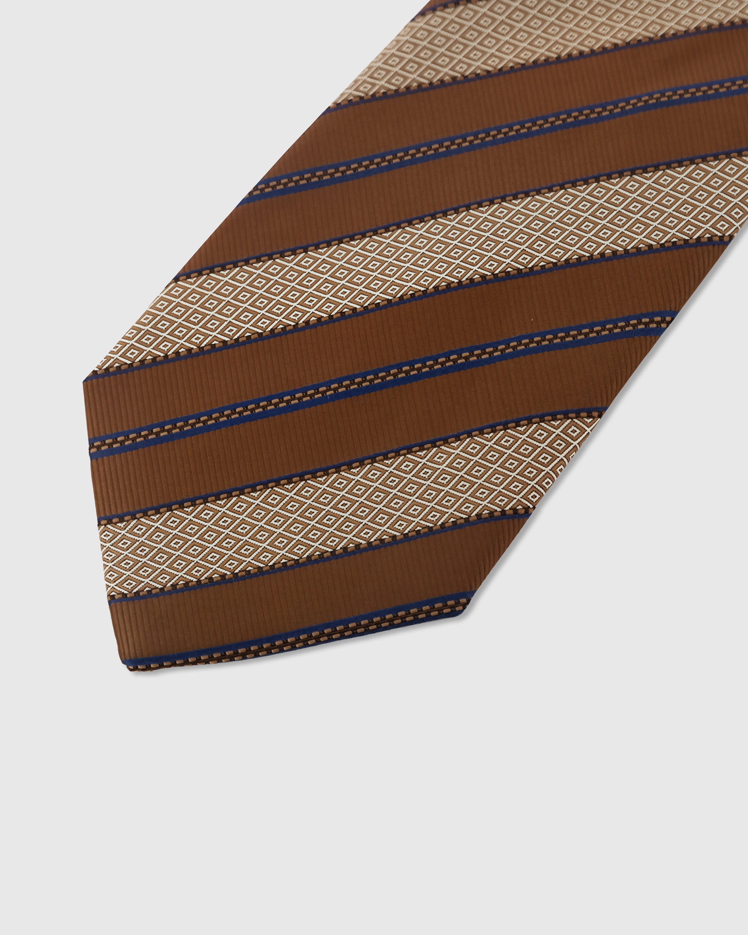 Mosaic stripe detail on cognac mulberry silk tie showing embroidered micro-square pattern by STICKYZOO