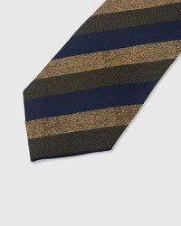 NAVY HERRINGBONE TIE — 45° Italian bias-cut construction with structured interlining, hand-finished slip stitching visible on interior