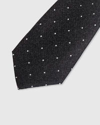 {Embroidered white pin dot detail} Pin dot detail on charcoal mulberry silk tie showing embroidered pattern by STICKYZOO