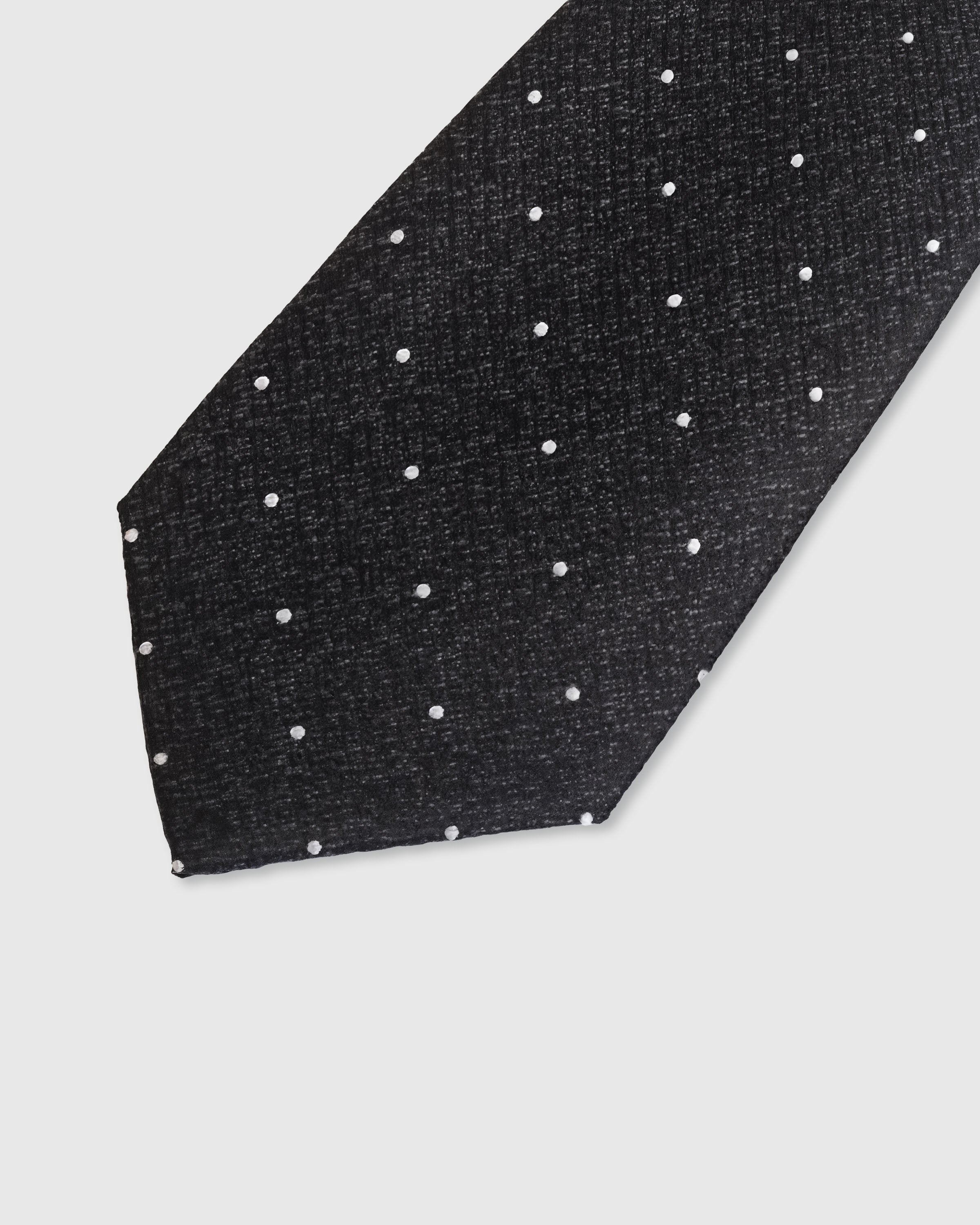 {Embroidered white pin dot detail} Pin dot detail on charcoal mulberry silk tie showing embroidered pattern by STICKYZOO