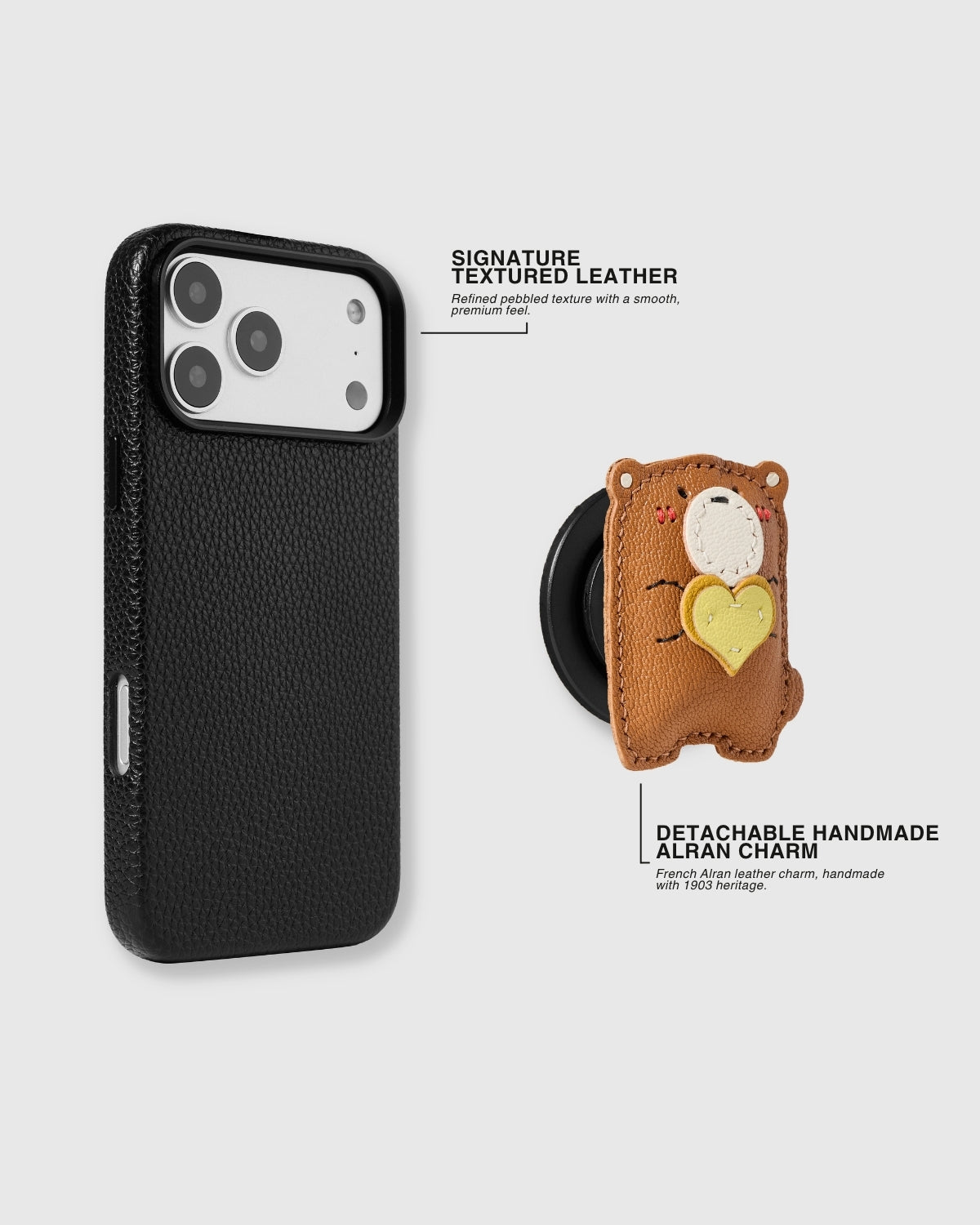 Textured black leather case and detachable handmade French Alran leather teddy bear charm shown separately — signature pebbled leather and magnetic MagSafe-compatible charm grip. Rated 4.9 stars.
