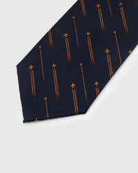 Orange airplane and contrail motif on navy mulberry silk tie showing hand-embroidered thread work by STICKYZOO