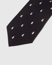 White penguin motif detail on onyx mulberry silk tie showing raised hand-embroidered thread by STICKYZOO