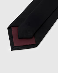 Tonal herringbone weave detail on onyx mulberry silk tie showing diagonal zigzag texture by STICKYZOO