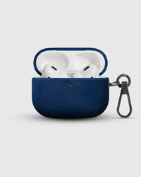 Midnight Navy Alcantara case open with AirPods Pro inside and suede-lined lid