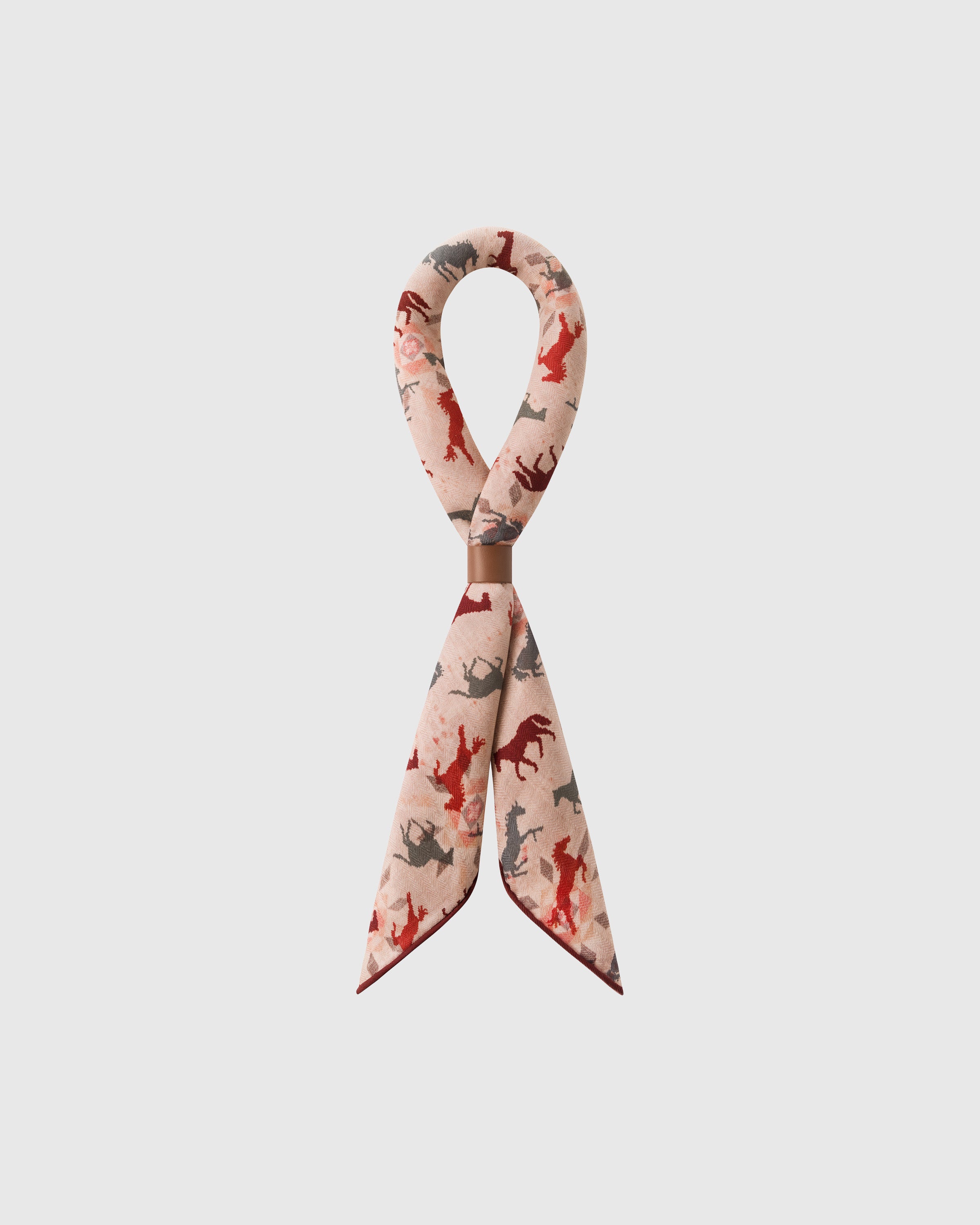 STICKYZOO galloping horses silk scarf looped through a leather ring showing the printed motif