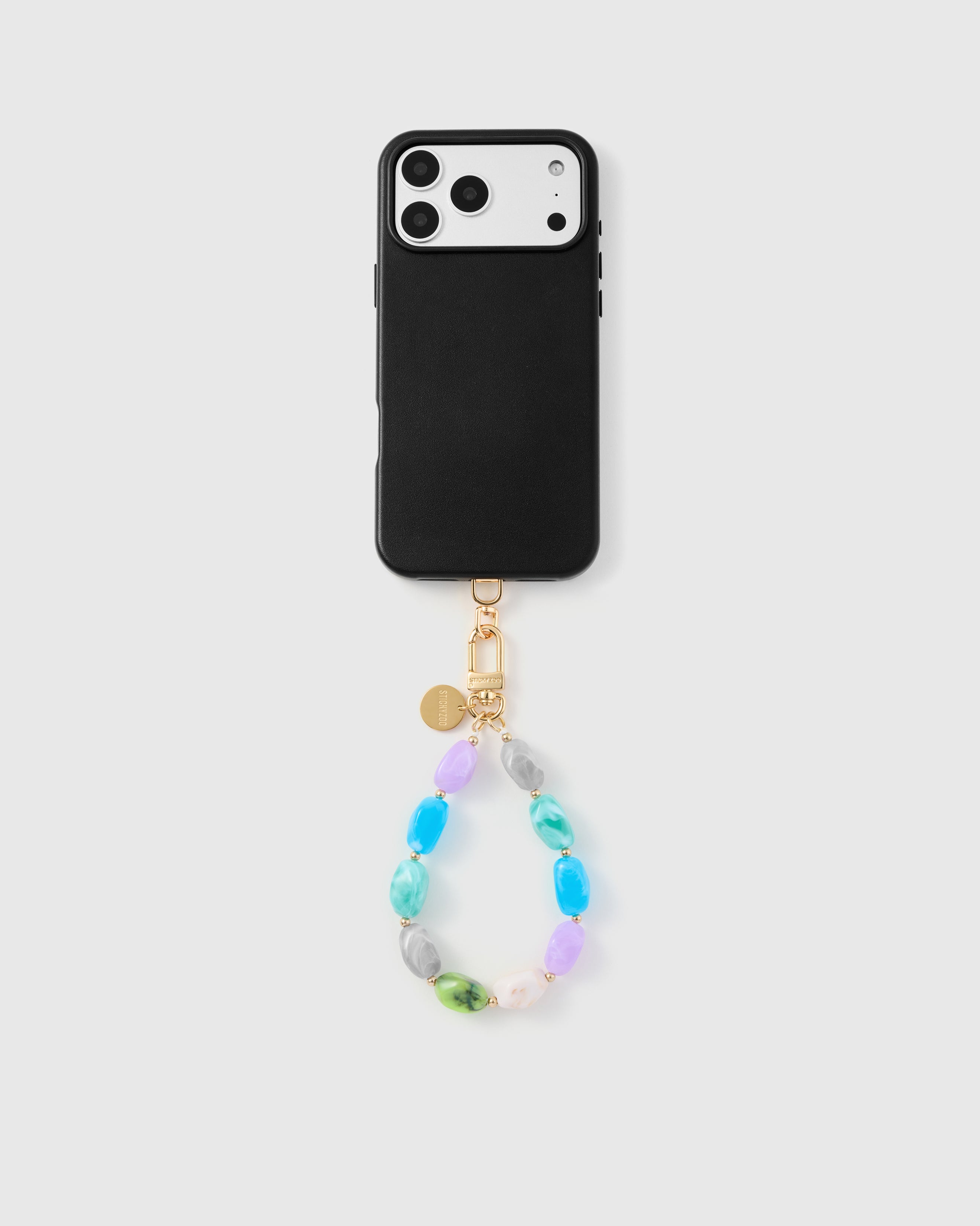STICKYZOO pastel marble phone strap attached to a phone, universal fit with any case