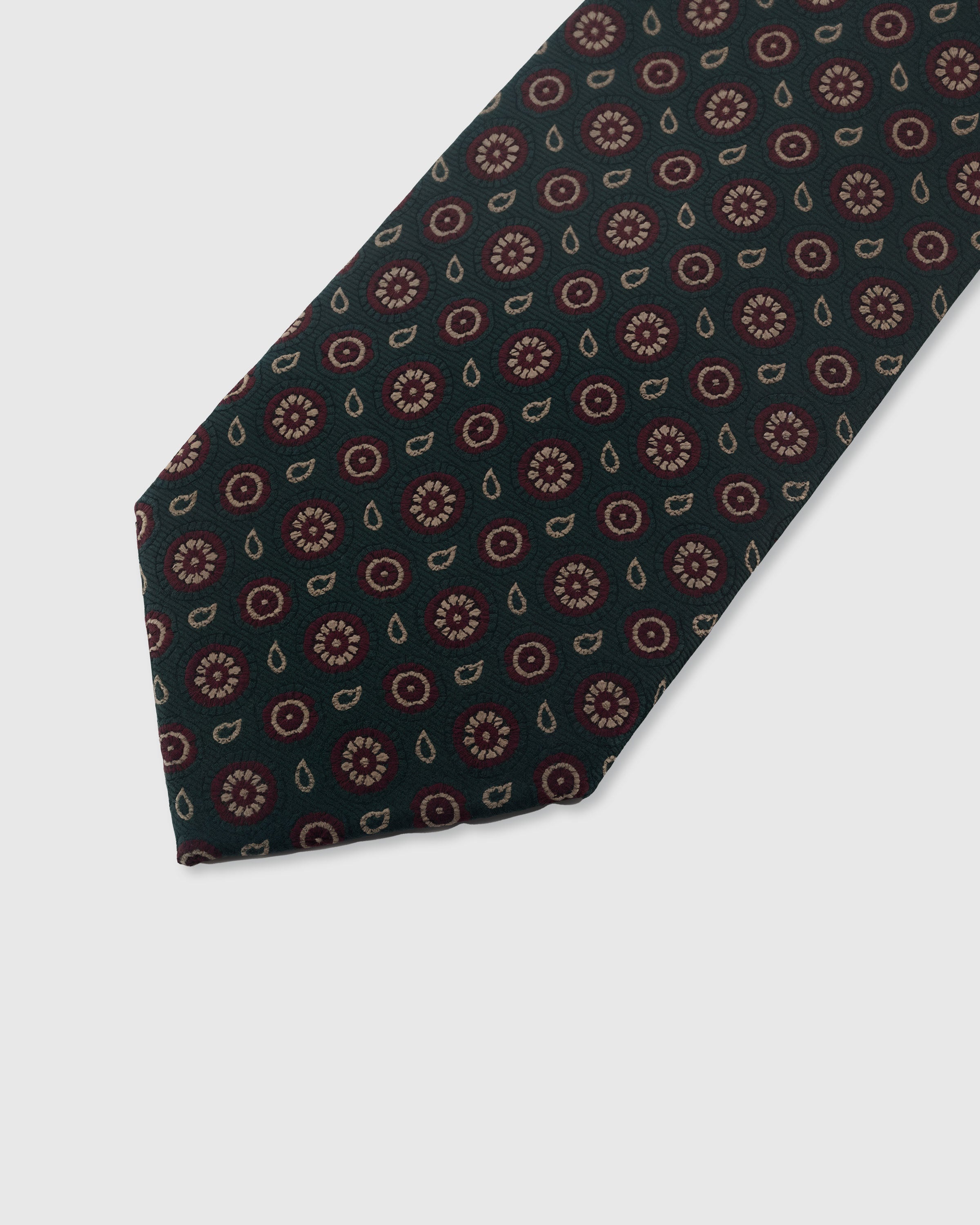 {Embroidered paisley circle foulard detail} Paisley detail on hunter green mulberry silk tie showing embroidered pattern by STICKYZOO