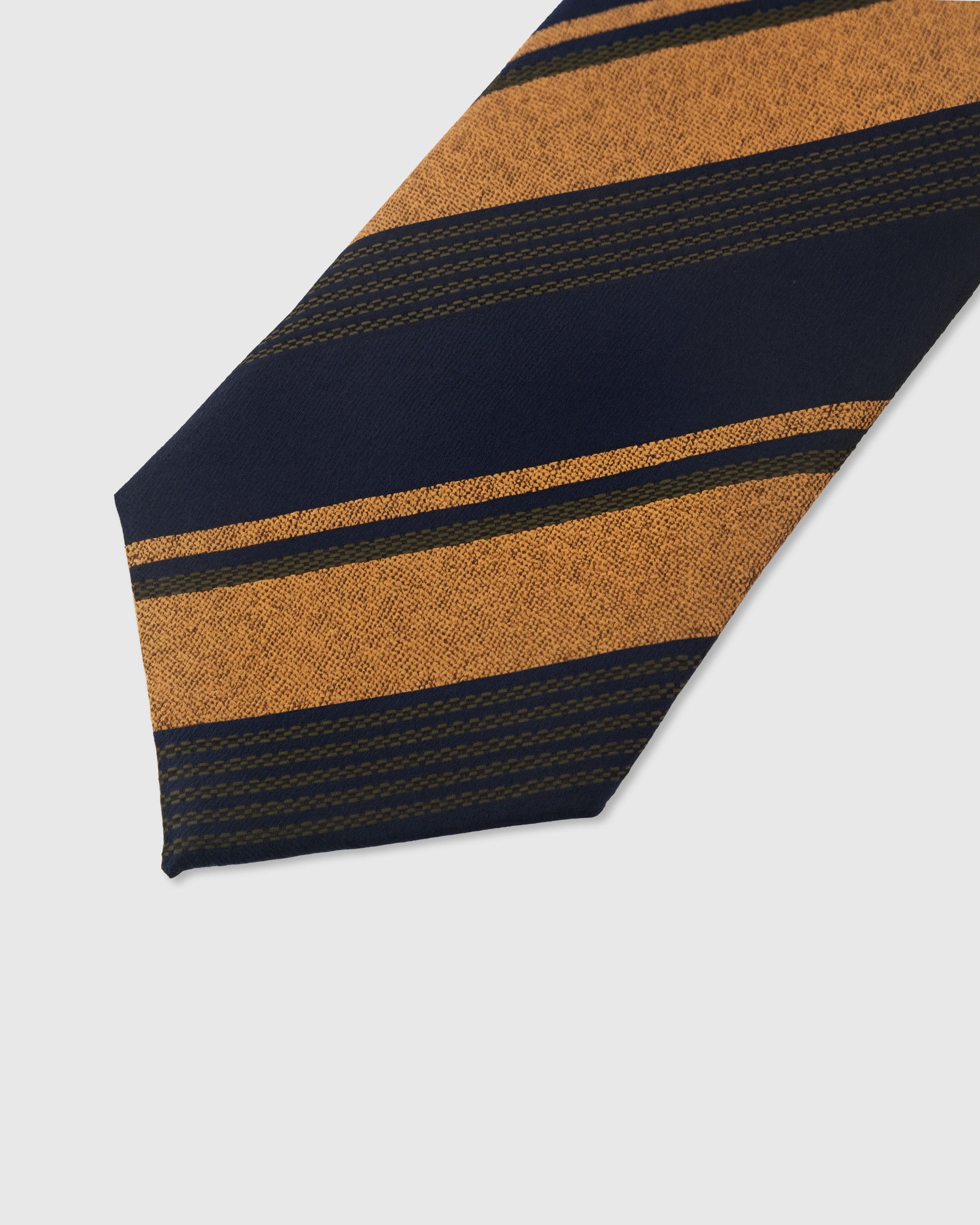 Club stripe detail on amber and midnight mulberry silk tie showing raised hand-embroidered thread by STICKYZOO