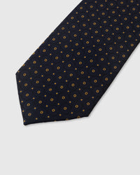 Gold medallion dot detail on midnight mulberry silk tie showing hand-embroidered raised thread by STICKYZOO