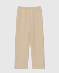 Back view of STICKYZOO Dachshund Apple Sweatpants in cream showing relaxed straight-leg proportions and clean finish