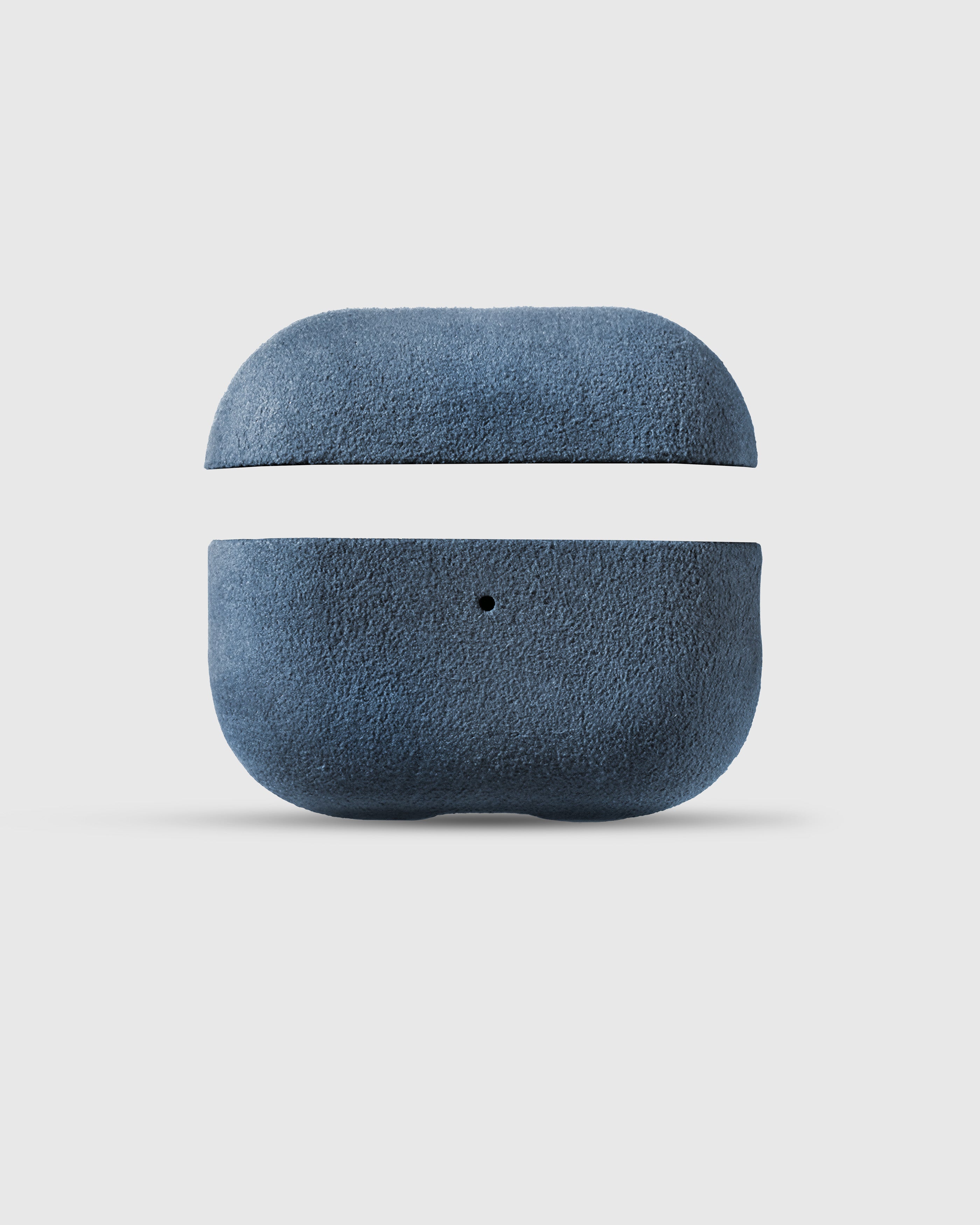 {{Not silicone — real Alcantara.}} STICKYZOO denim blue case showing dense Italian microfiber suede nap