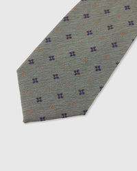 STICKYZOO Sage Floret Tie — detail of hand-embroidered scattered floret on pure mulberry silk