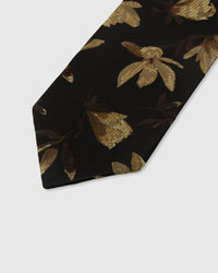 {Embroidered gilded gold bloom detail} Floral detail on noir black mulberry silk tie showing embroidered pattern by STICKYZOO