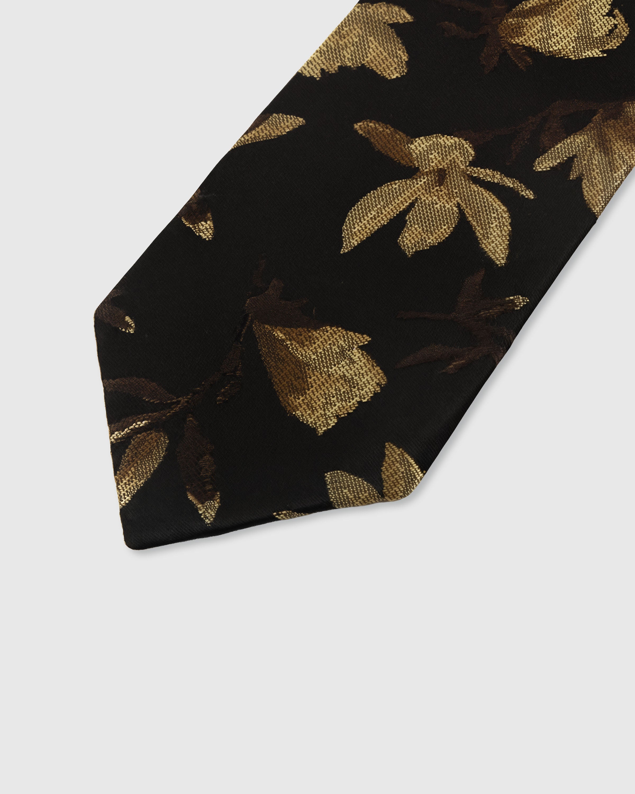 {Embroidered gilded gold bloom detail} Floral detail on noir black mulberry silk tie showing embroidered pattern by STICKYZOO