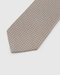 Tonal micro circle detail on pearl mulberry silk tie showing dense hand-embroidered rings by STICKYZOO