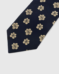 Gold blossom motif on navy mulberry silk tie showing hand-embroidered five-petal flower by STICKYZOO