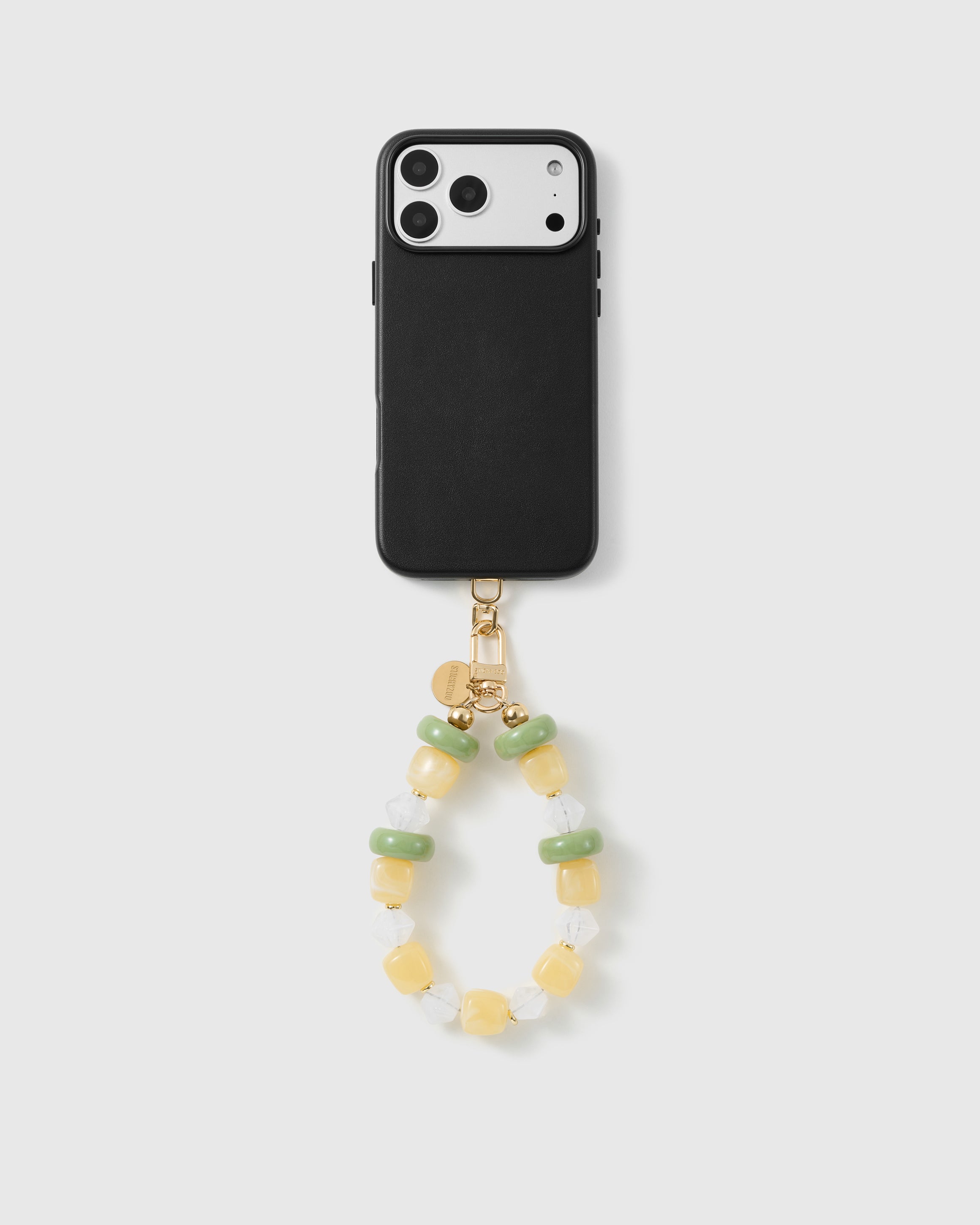 Handmade beaded phone strap on a black case, rated 4.9 across 5,000+ reviews
