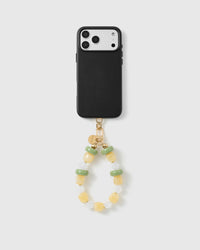 Handmade beaded phone strap on a black case, rated 4.9 across 5,000+ reviews