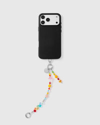 Full phone with rainbow bead charm strap attached on light grey background