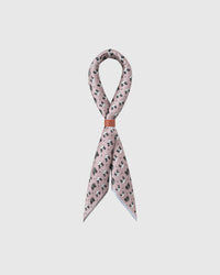 STICKYZOO blush panda silk scarf draped in a ribbon fold with a leather slide showing the panda print