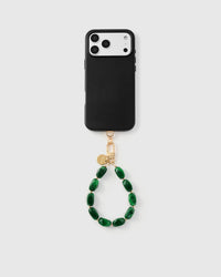 Full phone with emerald marble stone wristlet attached showing universal compatibility