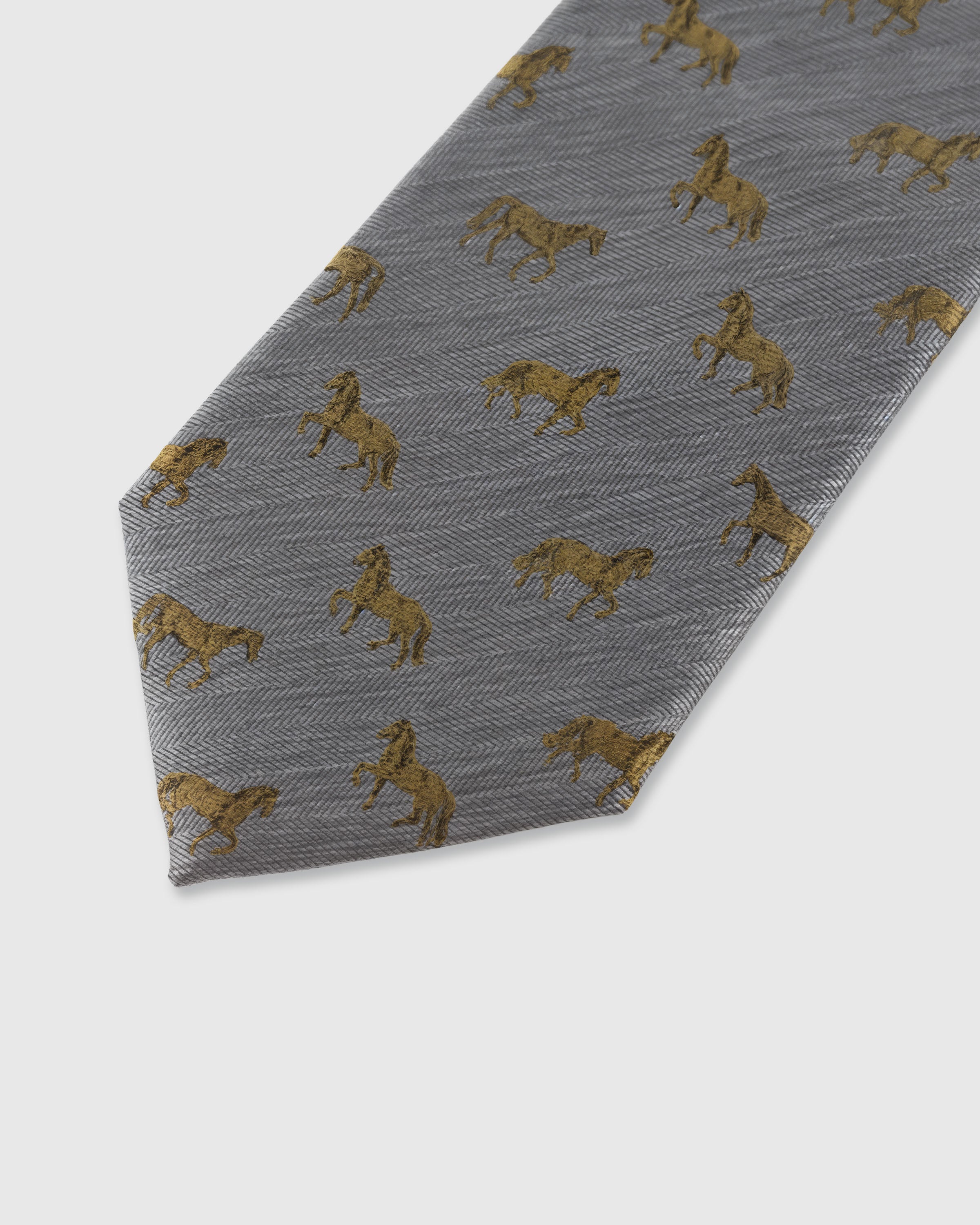 STICKYZOO Silver Stallion Tie — detail of hand-embroidered horse motif on pure mulberry silk
