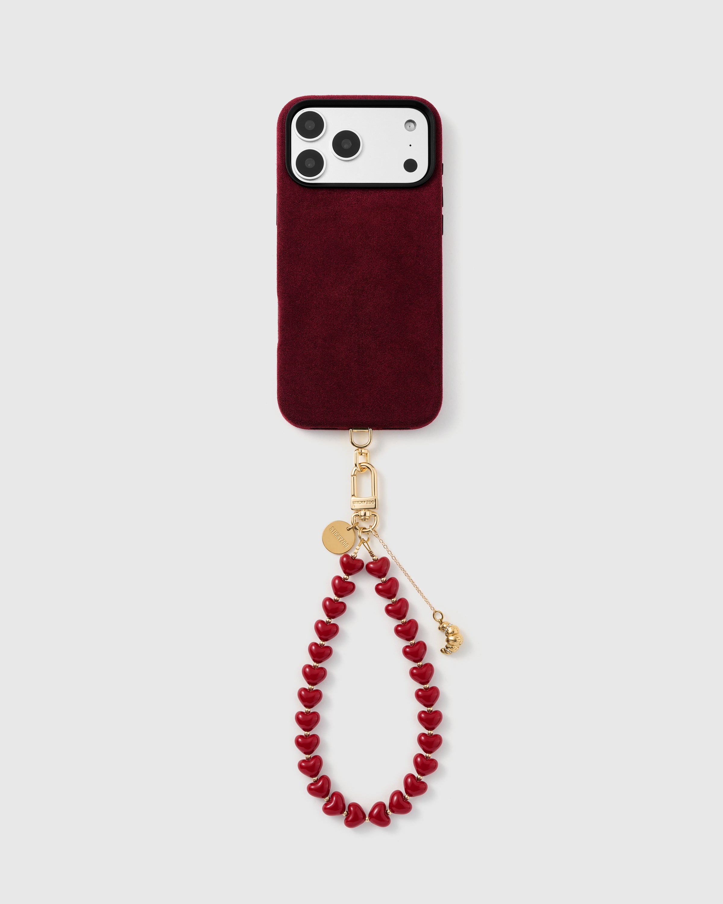Cherry heart bead strap with gold croissant charm clipped to phone case showing wristlet drape — 5,000+ Reviews