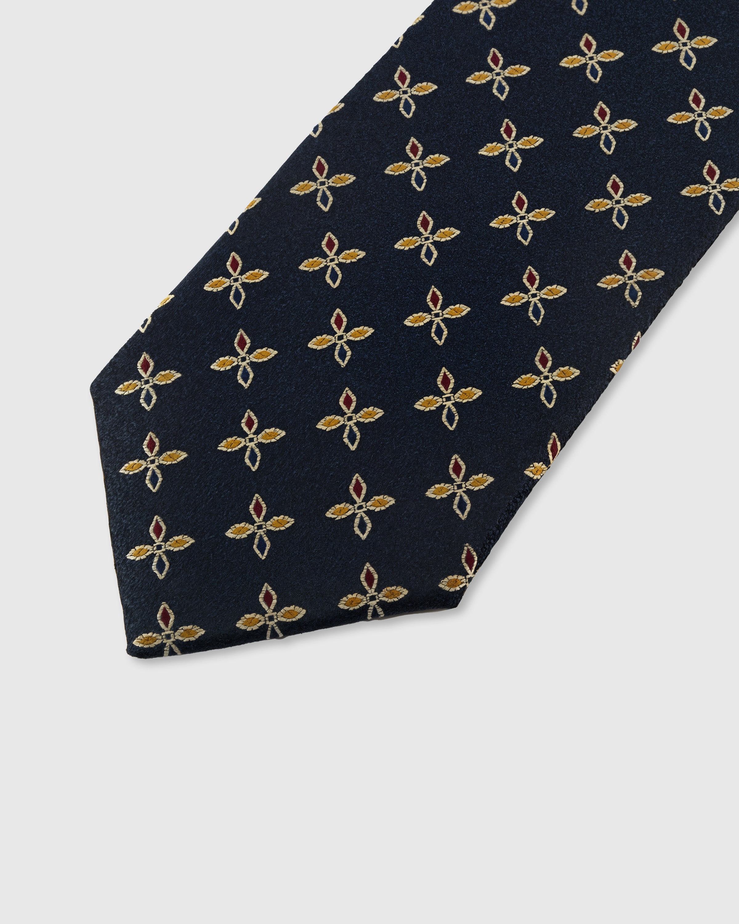 MIDNIGHT FLORET TIE — 45° Italian bias-cut construction with structured interlining, hand-finished slip stitching visible on interior