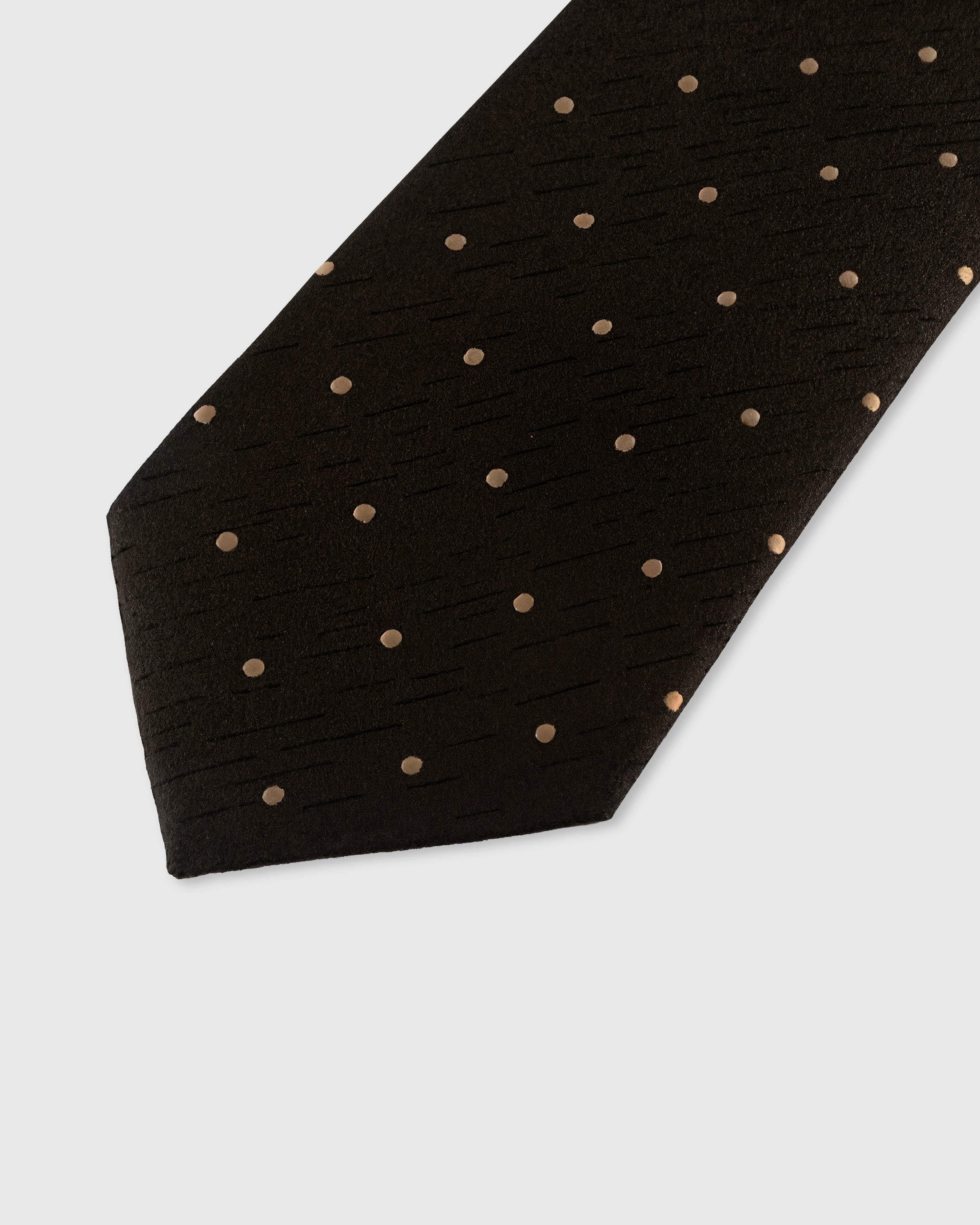 Gold pin dot detail on onyx mulberry silk tie showing hand-embroidered dots on textured ground by STICKYZOO