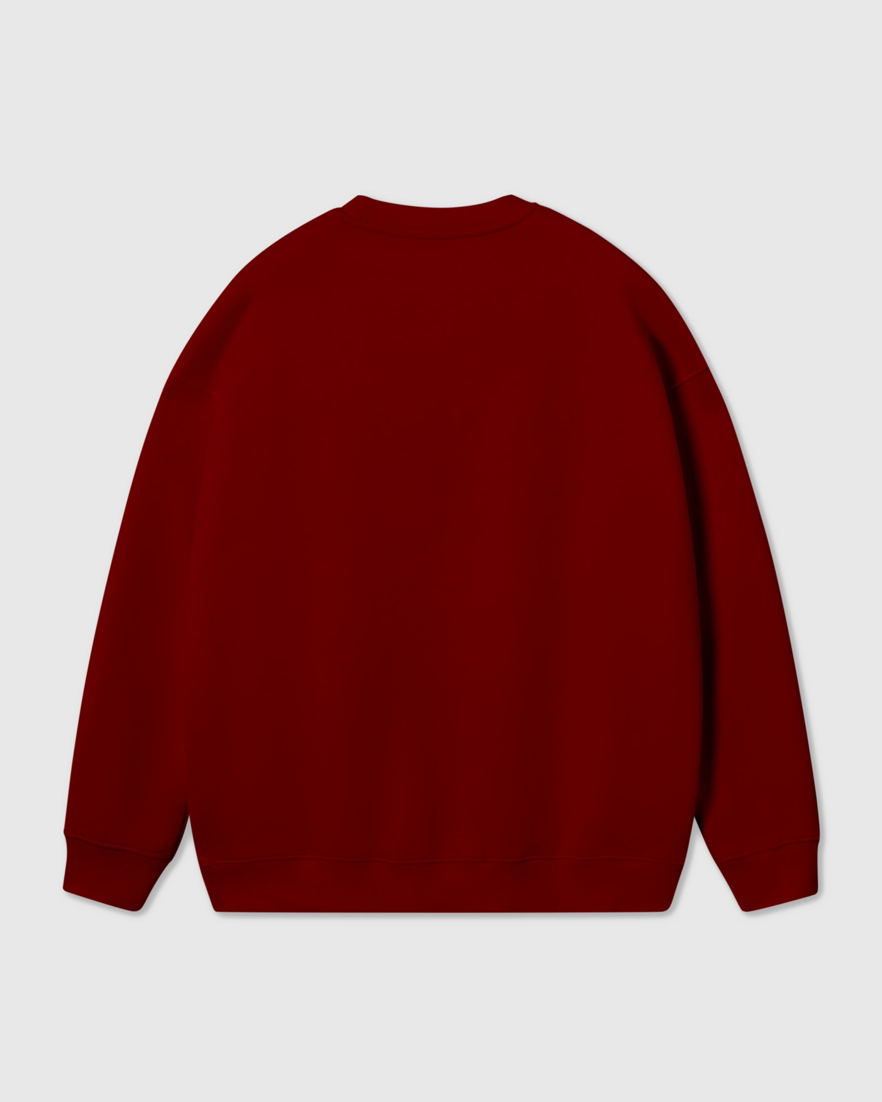 Model wearing Poodle Parade Sweatshirt in burgundy showing relaxed boxy fit and dropped shoulders