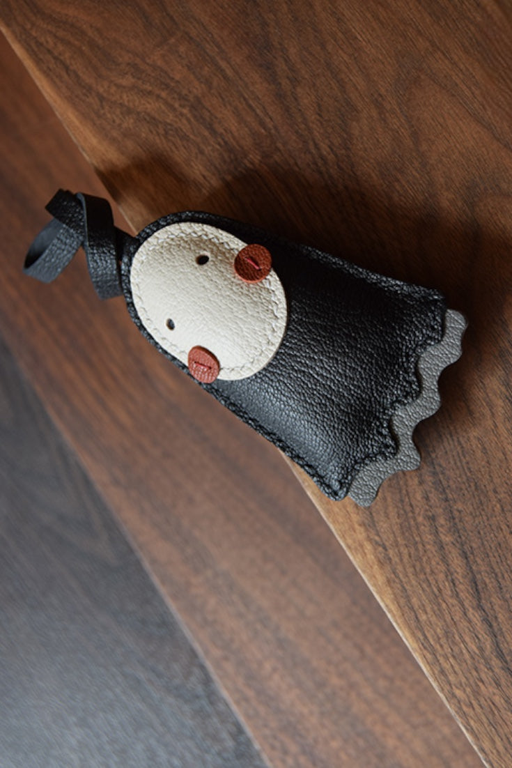 NO FACE CHARM
