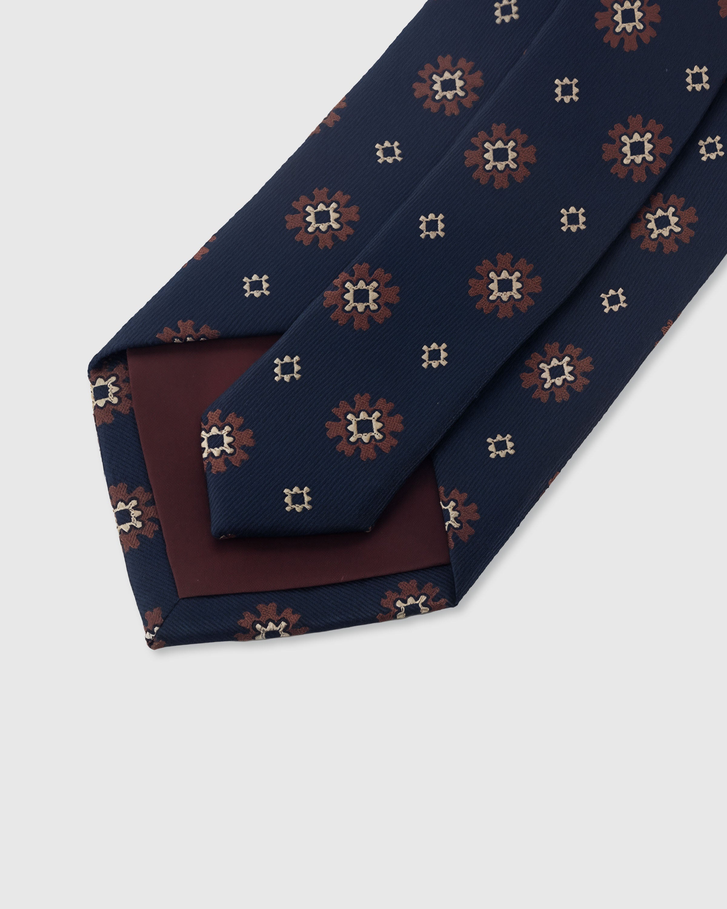 {Hand-finished interior} STICKYZOO MIDNIGHT EMBER FOULARD TIE back detail showing structured interlining and hand-finished slip stitching, 145 x 8 cm